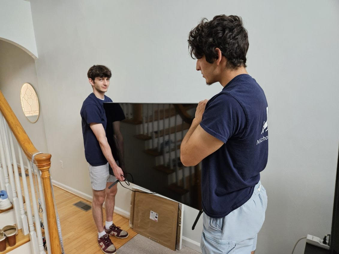 Nichols Moving Pros carefully moving your fragile items