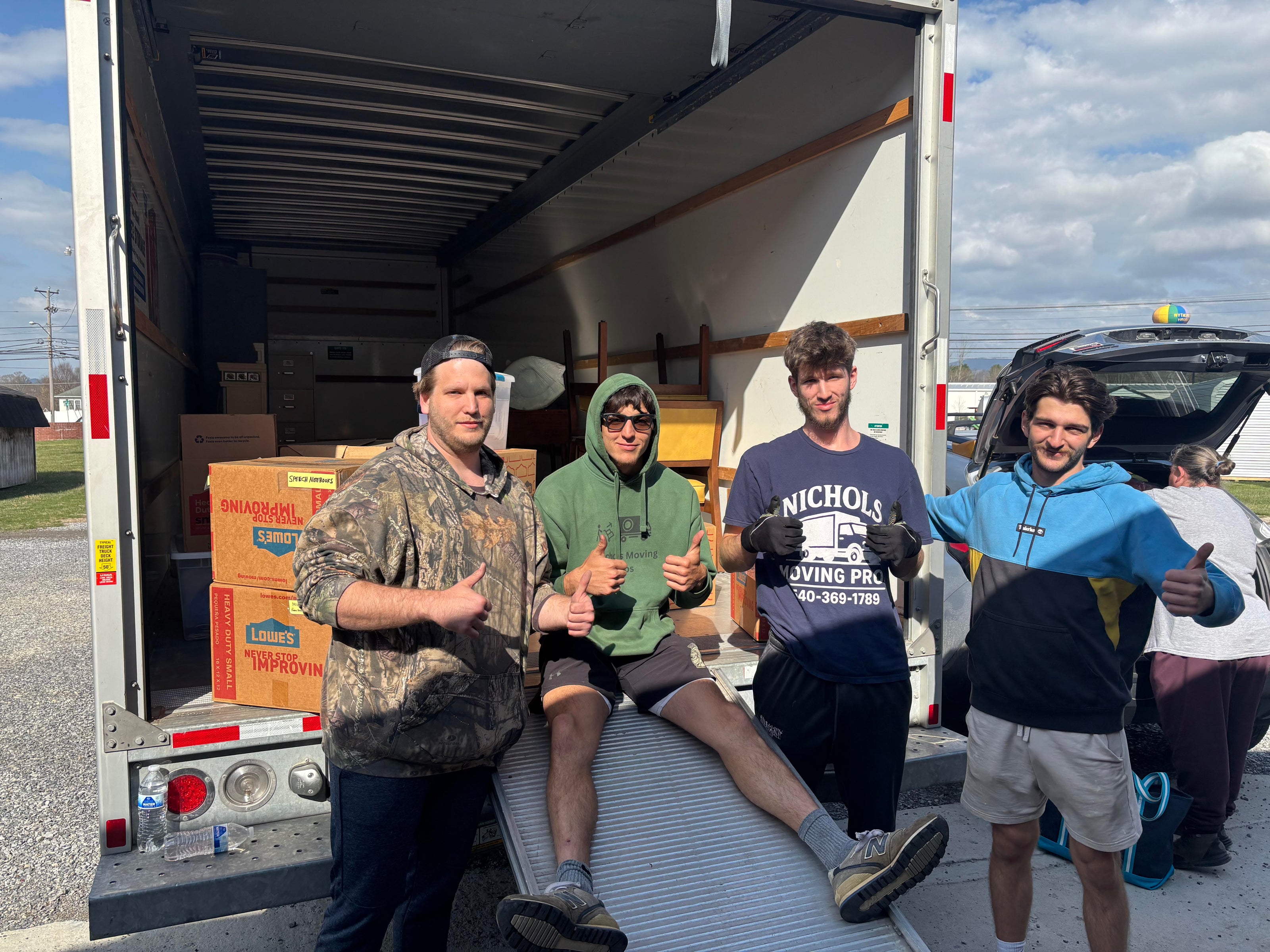 Nichols Moving Pros carefully loading a moving truck for a long-distance move from Roanoke, Virginia.